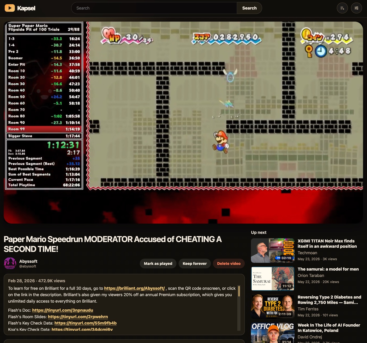 Kapsel watch page with player and up-next queue